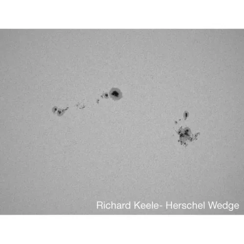 foto klin Herschela załamujący białe światło słoneczne Meade,  7